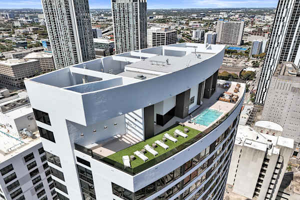 Stunning rooftop pool with panoramic city views—an exclusive luxury amenity in the heart of downtown Miami.