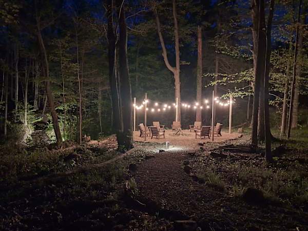 Newly added second firepit overlooking the woods and small waterfall.  