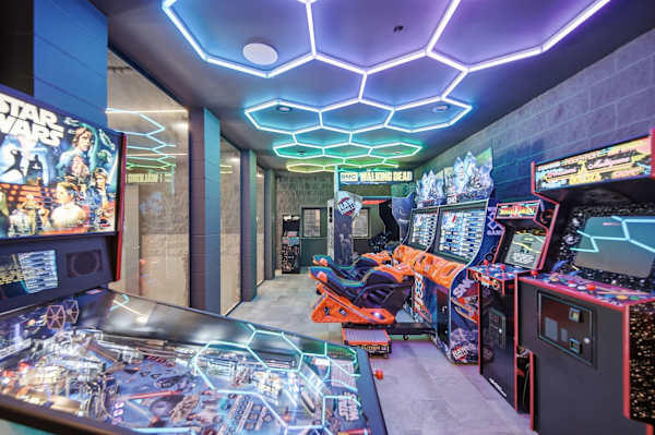 Arcade overlooks indoor pool and is free to play!