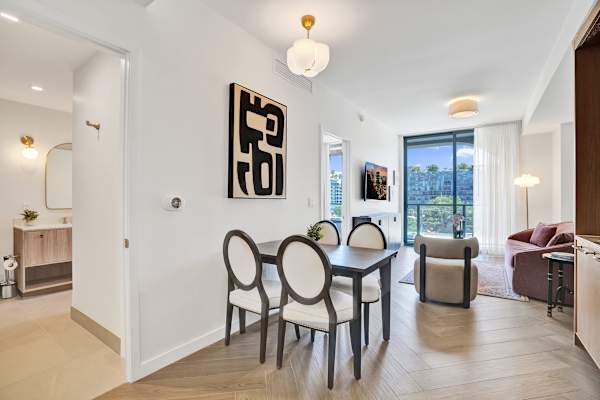 Dining area with herringbone floor and city light