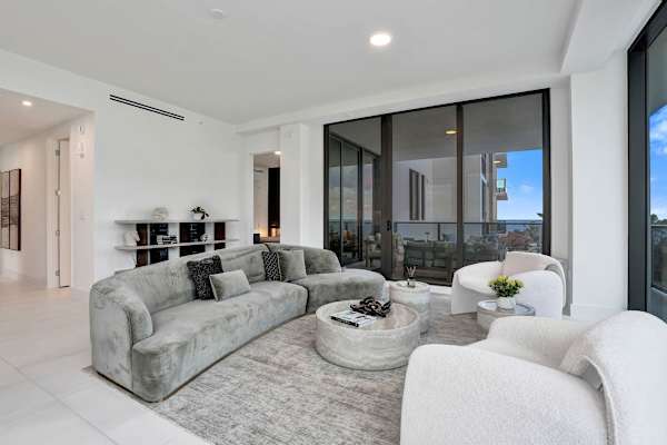 Bright living room with floor-to-ceiling windows