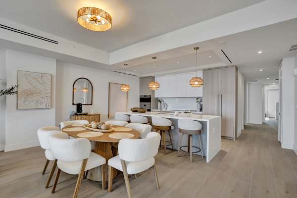 Oval dining table for six with kitchen view