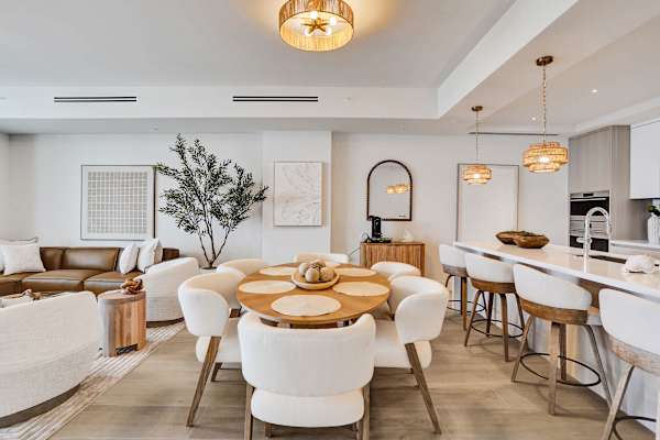 Dining area adjacent to kitchen bar island