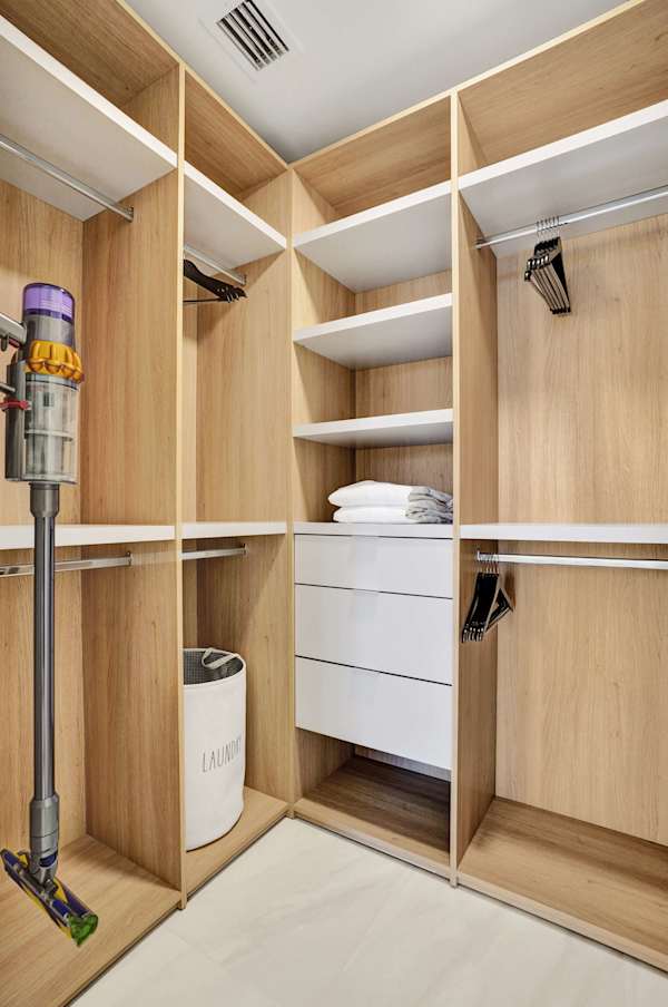 Each room has a spacious walk-in wardrobe with built-in shelving