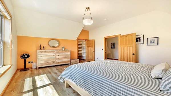 Comfortable queen bed ensures a restful night’s sleep.