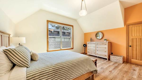 Enjoy privacy and comfort in thoughtfully designed guest bedrooms.