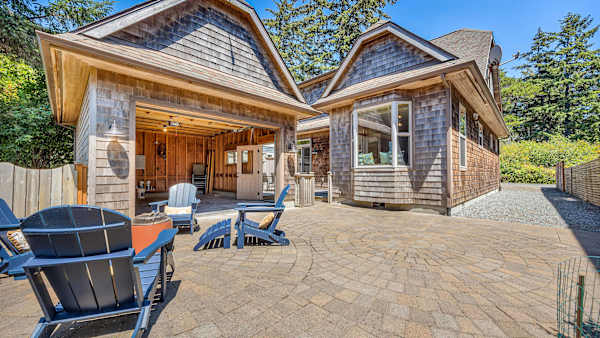 The private fenced yard gives dogs space to enjoy the outdoors safely.