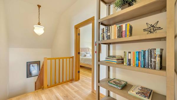 Upstairs, oversized bedrooms offer plenty of room to unwind.