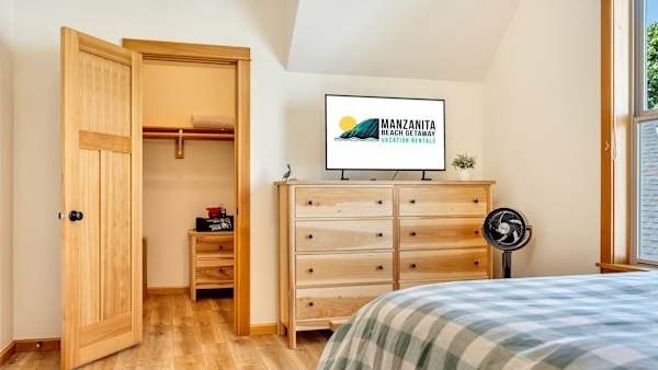 Cozy queen bedroom offers plenty of space to relax and unwind.