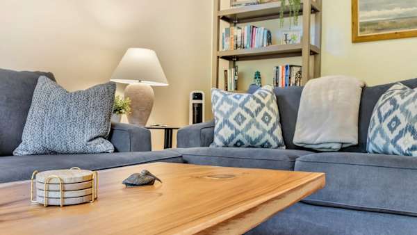 Comfortable seating invites you to slow down and enjoy your coastal getaway.