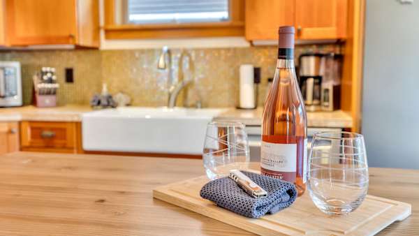 The well-appointed kitchen makes hosting family meals simple and enjoyable.