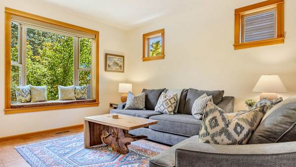 Sun-filled windows bring natural light into the comfortable main living space.