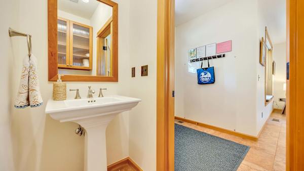 A thoughtfully designed bathroom offers a convenient space to refresh.