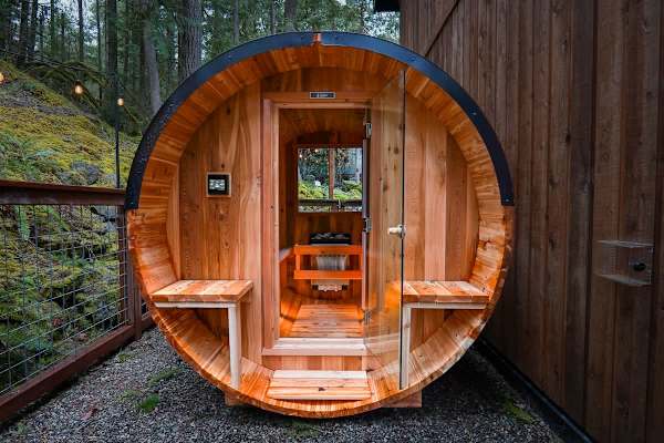 Melt away the day in the brand new barrel sauna with views of the trees. 