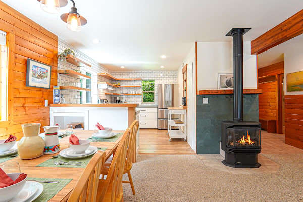 Cozy fireplace centrally located in the living room and dining room. 