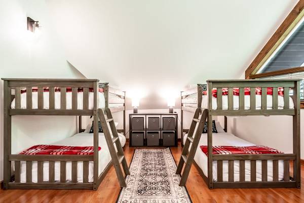 Bunk room with four twin beds