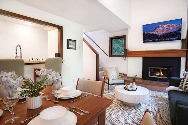 Dining table looking over to living room