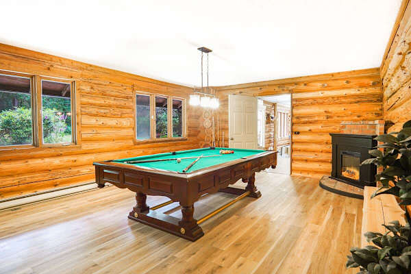 Billiards room with ping pong conversion top. 