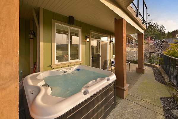 4 person hot tub with views on the lower floor with incredible views.