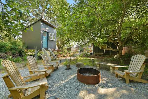 Backyard living and garden spaces. Please note that there is open burning bans seasonally thus the firepit use may not be available.