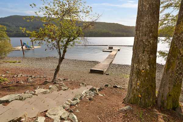 Lakeside beach and private dock.