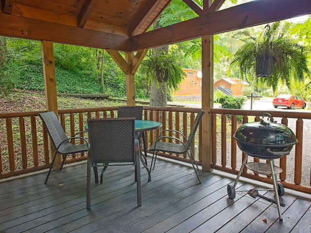 Front Porch with charcoal grill and dining area