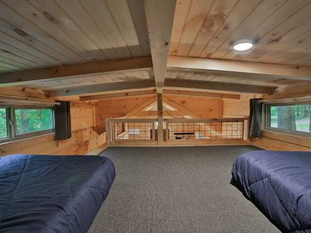 Low ceiling (4ft) lofted bedroom. Great for kids!