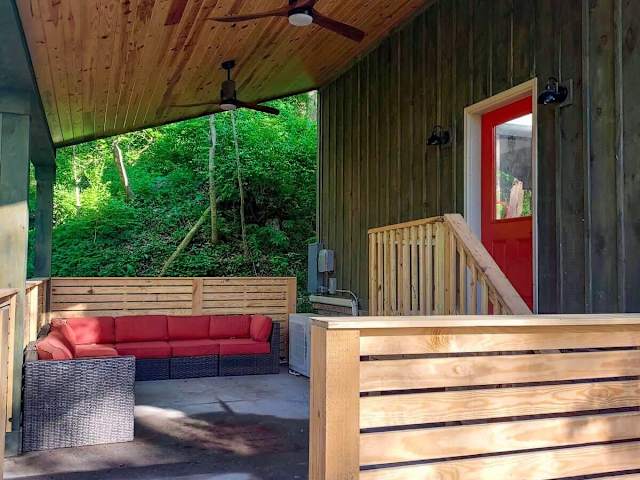 Outdoor living room of the Wauhatchie Train Depot at Wauhatchie Woodlands in Chattanooga, TN