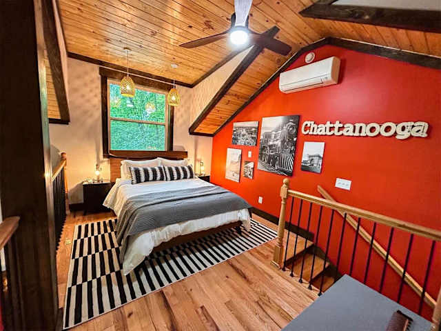 Sleeping loft with queen bed in the Wauhatchie Train Depot at Wauhatchie Woodlands in Chattanooga, TN