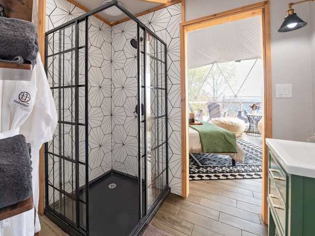 Your full bathroom comes stocked with bathrobes, towels, and our custom scented toiletries.