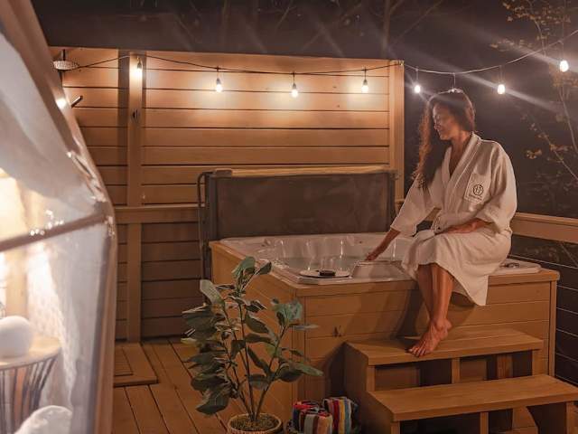 Soak in your private hot tub that is professionally serviced between each guest.