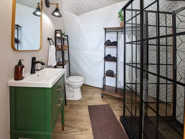 Your full bathroom comes stocked with bathrobes, towels, and our custom scented toiletries.