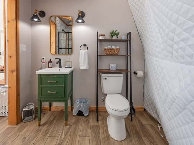 Your full bathroom comes stocked with bathrobes, towels, and our custom scented toiletries.