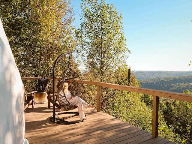 Enjoy a beautiful view from your deck in a cozy egg swing.