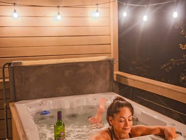 Soak in your private hot tub that is professionally serviced between each guest.