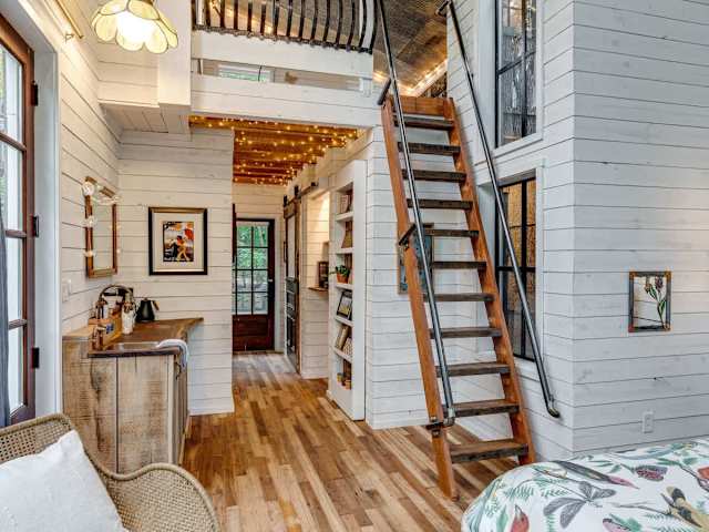 A view from the bedroom to the rest of the treehouse