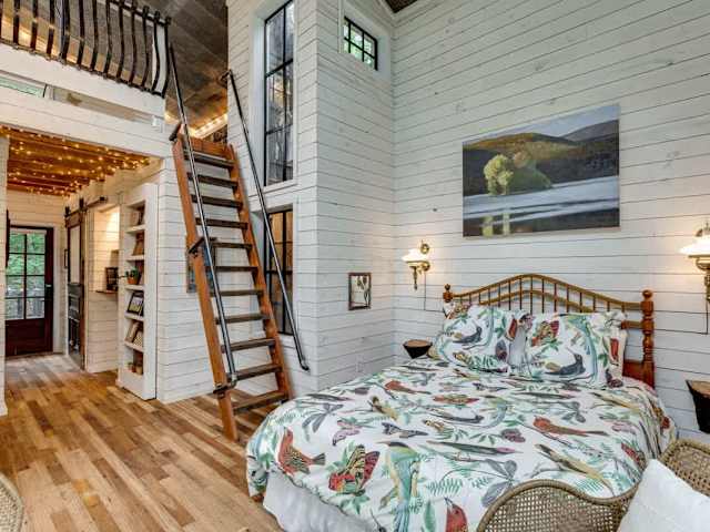 The bedroom leads to the loft