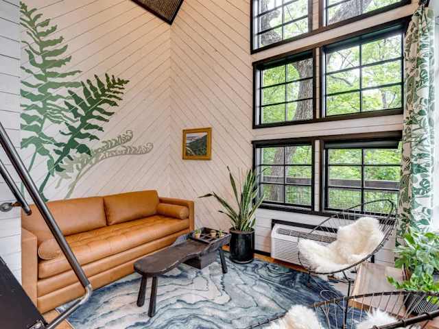 Enjoy floor to ceiling windows in the relaxing living space.