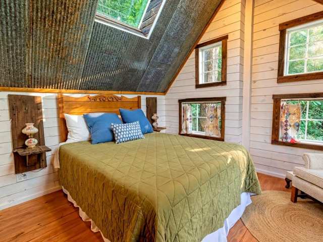 Comfortable queen bed in the loft bedroom