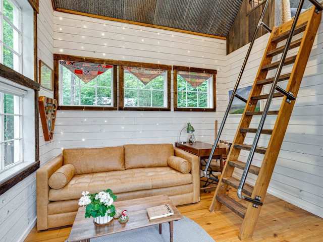 The living room sofa coverts to a comfortable bed with memory foam mattress