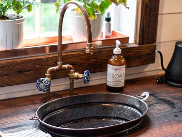 A custom hammered copper sink