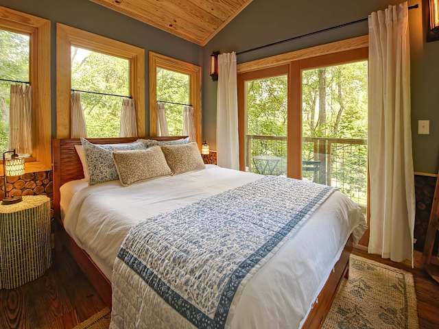 Cozy queen bedroom up in the trees