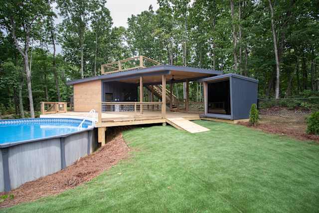 Outdoor communal pool, sauna, outdoor kitchen, & rooftop deck