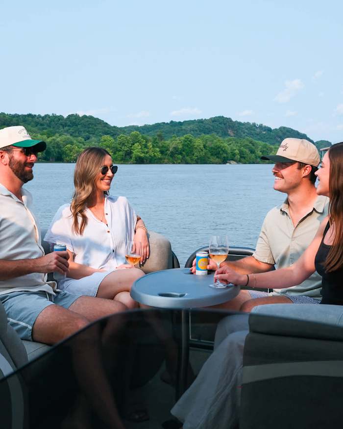 Friends on a boat by the Riverside House near Nashville