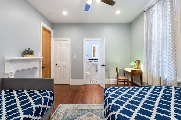 Michou's Marigny Historic Gem | Historic Getaways — bed1-towards-bath and closet