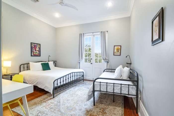 Governors Historic Home- Sleeps 10 - Steps to FQ — Bedroom 1 - King and Twin Daybed with balcony and ensuite bath