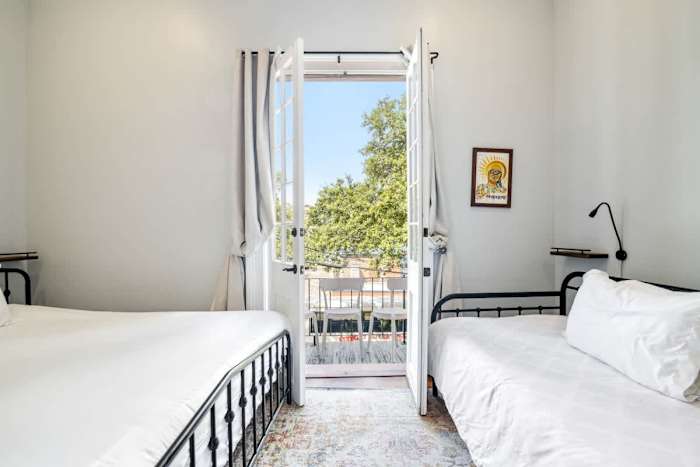 Governors Historic Home- Sleeps 10 - Steps to FQ — Bedroom 1 - King and Twin Daybed with balcony and ensuite bath