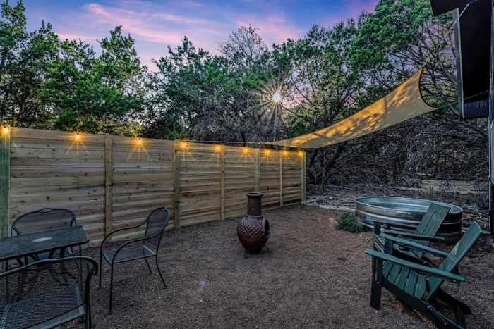 Romantic Cabin | Cowboy Pool & Patio | Near Wine! — Patio with Cowboy Pool, Adirondacks Chairs, Chiminea, and Table and Chairs.