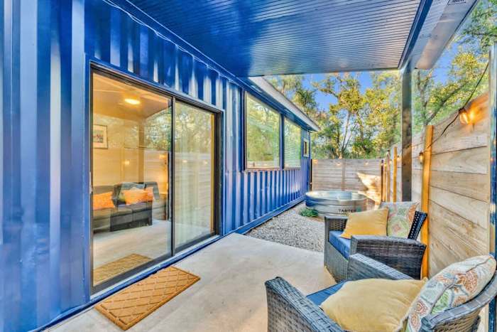 Unique Shipping Container |Cowboy Pool & Hot Tub — Comfy chairs on the patio