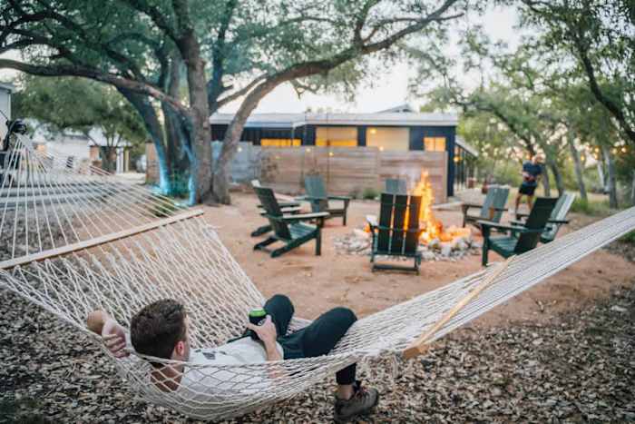 Sleeps 20+| Hot Tubs | Cowboy Pools | Projector TV — Who doesn't like a cold one by the fire?